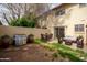 Inviting backyard featuring a lush lawn, patio furniture, and a barbecue grill at 3605 W Bethany Home Rd # 7, Phoenix, AZ 85019