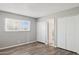 A naturally lit bedroom features two closets and vinyl flooring at 3605 W Bethany Home Rd # 7, Phoenix, AZ 85019
