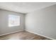 This naturally lit bedroom offers neutral paint colors, and hard surface floors at 3605 W Bethany Home Rd # 7, Phoenix, AZ 85019