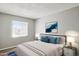 This airy bedroom offers natural light, modern interior design and neutral paint at 3605 W Bethany Home Rd # 7, Phoenix, AZ 85019