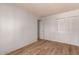 Bright bedroom with ample closet space and wood-look tile flooring at 3605 W Bethany Home Rd # 7, Phoenix, AZ 85019