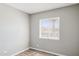 A bright bedroom features natural light, a neutral color palette, and vinyl flooring at 3605 W Bethany Home Rd # 7, Phoenix, AZ 85019