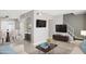 Bright living room showcasing an open floor plan with wood floors, modern décor, and a stairway to the second level at 3605 W Bethany Home Rd # 7, Phoenix, AZ 85019