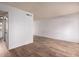 Large, bright living room with wood-look tile flooring at 3605 W Bethany Home Rd # 7, Phoenix, AZ 85019