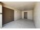 Open garage space featuring ample storage and a gray concrete floor at 4165 E Huntington Dr, Phoenix, AZ 85040