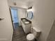 Bathroom featuring dual sinks, modern fixtures, and a toilet at 4210 W Solano Dr, Phoenix, AZ 85019