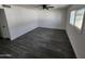 Bright bedroom features modern flooring and a window that offers ample natural light at 4210 W Solano Dr, Phoenix, AZ 85019
