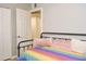 Bedroom with a colorful comforter and plenty of closet space at 441 E Encinas Ave, Gilbert, AZ 85234