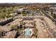 Aerial view of luxurious apartment complex, featuring a central pool and lush landscaping at 4455 E Paradise Village Pkwy # 1051, Phoenix, AZ 85032