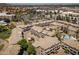 Aerial view of apartment complex with manicured landscaping, pool, and ample parking at 4455 E Paradise Village Pkwy # 1051, Phoenix, AZ 85032