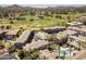 Aerial view of golf course community, showcasing lush green landscaping and pool at 4455 E Paradise Village Pkwy # 1051, Phoenix, AZ 85032