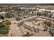Aerial view of community near shopping, featuring mature trees, green space and outdoor amenities at 4455 E Paradise Village Pkwy # 1051, Phoenix, AZ 85032