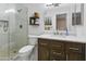 Bright bathroom featuring a glass shower and vanity with marble counters at 4455 E Paradise Village Pkwy # 1051, Phoenix, AZ 85032