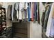 Walk-in closet with built-in storage, clothing racks, and organization at 4455 E Paradise Village Pkwy # 1051, Phoenix, AZ 85032