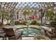 Relaxing hot tub with pergola and outdoor seating in a private courtyard setting at 4455 E Paradise Village Pkwy # 1051, Phoenix, AZ 85032