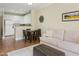 Bright living room with combined kitchen and dining area, perfect for entertaining guests at 4455 E Paradise Village Pkwy # 1051, Phoenix, AZ 85032