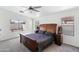 Inviting main bedroom with a large bed, natural light, and a serene ambiance for restful nights at 46141 W Amsterdam Rd, Maricopa, AZ 85139