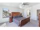 Comfortable main bedroom featuring a large bed, natural light, and relaxing atmosphere at 46141 W Amsterdam Rd, Maricopa, AZ 85139