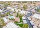 Aerial view featuring a refreshing pool, tennis court, mature trees and covered parking within a vibrant community at 536 S Evergreen Rd, Tempe, AZ 85288