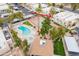 Aerial view of the community pool, tennis court, spa, and landscaping for residents at 536 S Evergreen Rd, Tempe, AZ 85288
