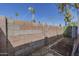 View of the block fence and gate in the backyard of the property at 536 S Evergreen Rd, Tempe, AZ 85288