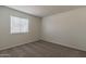 A carpeted bedroom with blinds covering the single window at 536 S Evergreen Rd, Tempe, AZ 85288