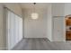 Cozy dining room with neutral carpet, modern lighting fixture, and bright natural light at 536 S Evergreen Rd, Tempe, AZ 85288
