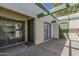 Charming outdoor patio with a pergola, doors, and windows creating a seamless transition between indoor and outdoor living spaces at 536 S Evergreen Rd, Tempe, AZ 85288