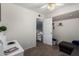 Comfortable bedroom with a ceiling fan and access to the upstairs, ideal for relaxing and enjoying quiet moments at 542 N Orlando Cir, Mesa, AZ 85205