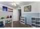 Vibrant bedroom with wall shelves, storage, and a cozy bunk bed with carpet flooring, perfect for  at 542 N Orlando Cir, Mesa, AZ 85205