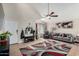 Inviting living room showcasing tile floors, neutral walls, and a cozy seating arrangement at 542 N Orlando Cir, Mesa, AZ 85205