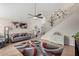 Spacious living room featuring tile floors, soaring ceilings, and ample natural light at 542 N Orlando Cir, Mesa, AZ 85205