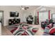 Inviting living room showcasing tile floors, neutral walls, and a cozy seating arrangement at 542 N Orlando Cir, Mesa, AZ 85205