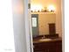 Bathroom vanity with granite countertops and a decorative vanity light at 5877 N Granite Reef Rd # 2257, Scottsdale, AZ 85250