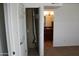 Bedroom with white walls, carpet and closet with laundry access and bathroom access at 5877 N Granite Reef Rd # 2257, Scottsdale, AZ 85250