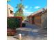 Community exterior shows manicured landscaping and charming walkways with mailbox at 5877 N Granite Reef Rd # 2257, Scottsdale, AZ 85250