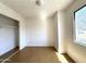 Bedroom features hardwood flooring, closet, and a window at 600 S Dobson Rd # 148, Mesa, AZ 85202