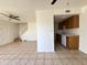 An open-concept floor plan combines living, dining, and kitchen areas, enhanced by tile flooring at 600 S Dobson Rd # 148, Mesa, AZ 85202