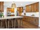 Spacious kitchen with stainless steel appliances, a large island, and ample storage for the home chef at 613 E Vista Ave, Phoenix, AZ 85020