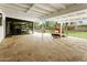 Spacious covered patio overlooking the pool and backyard at 613 E Vista Ave, Phoenix, AZ 85020