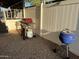 Backyard featuring a gravel area and two grills, ideal for outdoor cooking and entertaining at 6960 W Peoria Ave # 212, Peoria, AZ 85345