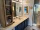 The bathroom offers a vanity, storage, and a separate shower area, with nautical themed decor at 6960 W Peoria Ave # 212, Peoria, AZ 85345
