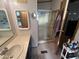 A well-organized bathroom features a shower stall, vanity, and decorative elements for style at 6960 W Peoria Ave # 212, Peoria, AZ 85345