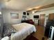 Bright bedroom boasting beamed ceilings, ceiling fan, and ample space for relaxing and unwinding at 6960 W Peoria Ave # 212, Peoria, AZ 85345