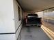 Carport featuring a pickup truck, for shade and protection at 6960 W Peoria Ave # 212, Peoria, AZ 85345