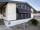Charming home with an attractive awning and meticulous landscaping at 6960 W Peoria Ave # 212, Peoria, AZ 85345