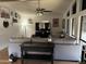 Spacious living room with a large gray sofa and bright, natural light at 6960 W Peoria Ave # 212, Peoria, AZ 85345