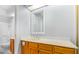 Bright bathroom with a modern vanity and sink, large mirror, and neutral tones at 700 E Mesquite Cir # N125, Tempe, AZ 85288