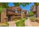 Charming condo exterior with well-maintained landscaping and inviting walkway, enhancing curb appeal at 700 E Mesquite Cir # N125, Tempe, AZ 85288