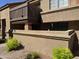Charming condo exterior with a private balcony, a cozy patio, and well-maintained landscaping at 700 E Mesquite Cir # N125, Tempe, AZ 85288